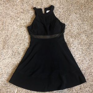 Sleeveless black skater dress